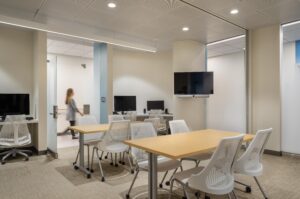 A movable partition joins Pods 2 and 3 Faculty Rooms into one space. Frosted glass maintains privacy while allowing visibility.